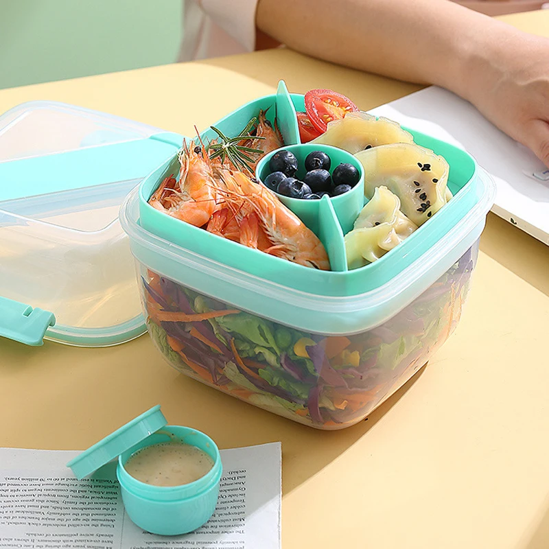 https://ae01.alicdn.com/kf/S354ced92d8054a4aaeba5d955124d0c11/Portable-Lunch-Box-Salad-Container-New-2-Layer-Lunch-Seal-Container-Set-with-Fork-Sauce-Cup.jpg