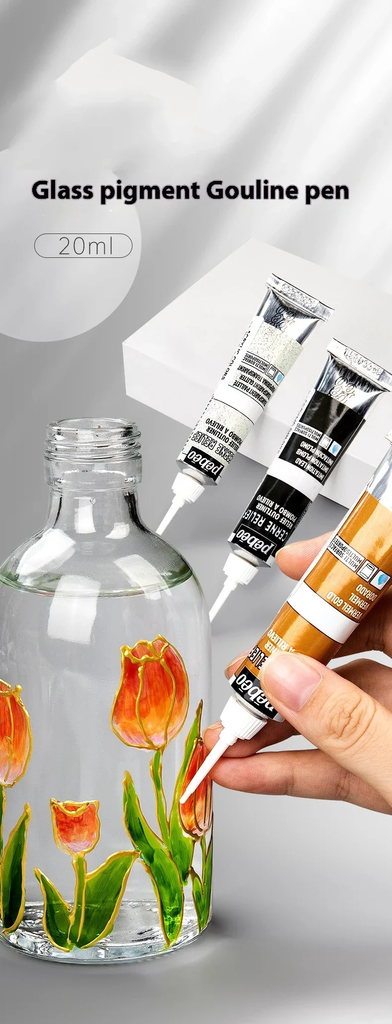 Tube of Pebeo acrylic paint held near a painted surface