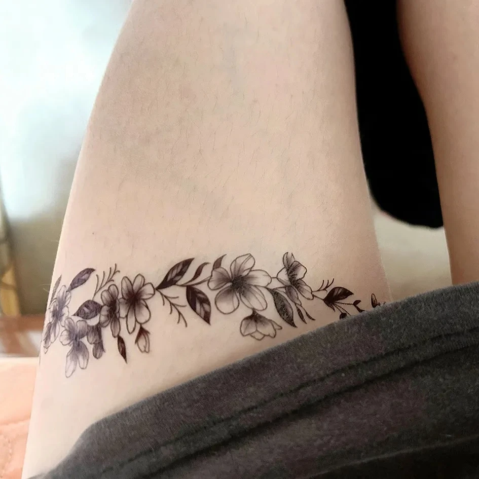 Female Wrap Around Thigh Tattoos That Wow