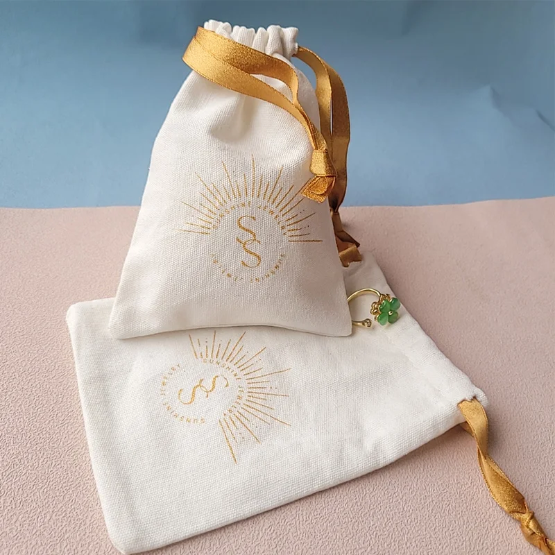 

Cotton Gift Bags Gold Ribbon Logo 7x9cm 9x12cm 10x15cm pack of 50 Eyelashes Makeup Dust Sack Jewelry Drawstring Pouches