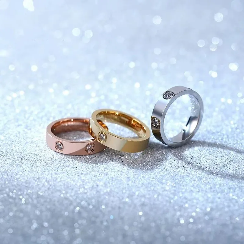 Tanie Modny stal nierdzewna różowe złoto kolor miłość pierścień dla kobiet mężczyzn para