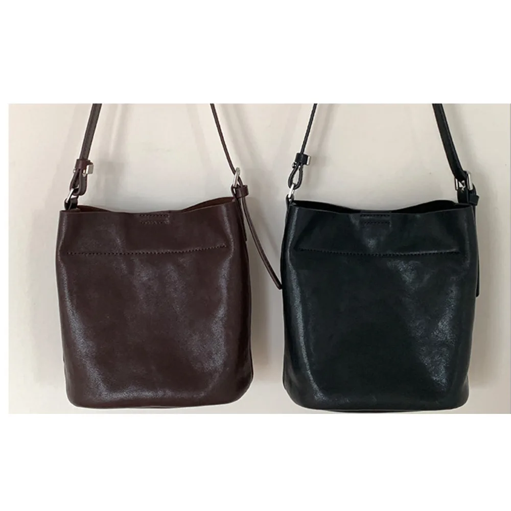 【 Genuine leather 】 Head layer cowhide bucket minimalist style single shoulder armpit women's crossbody small bag_voghion.com