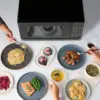 NEW Compact Countertop Microwave Oven 1.1 Cu. Ft. 1100-Watt with LED Lighting, Child Lock, Easy Clean Grey Interior, Black 6