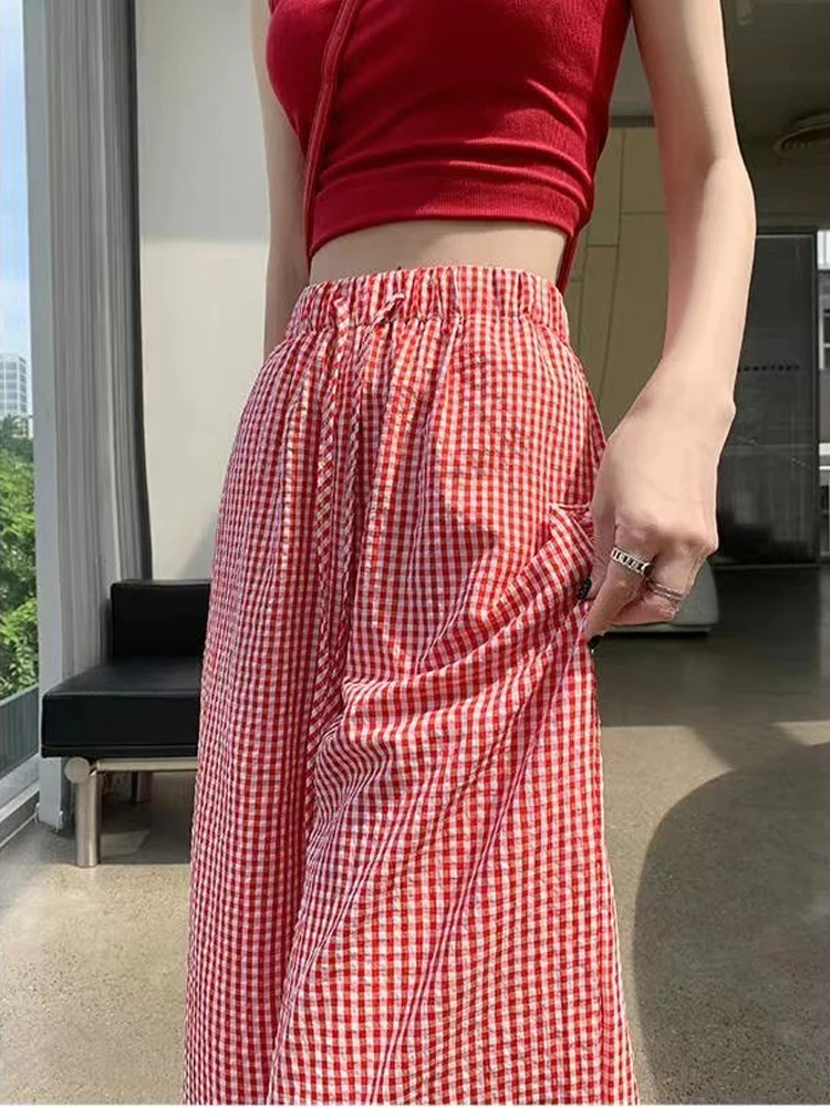 Рисунок 5 - Брюки женские в клетку с широкими штанинами