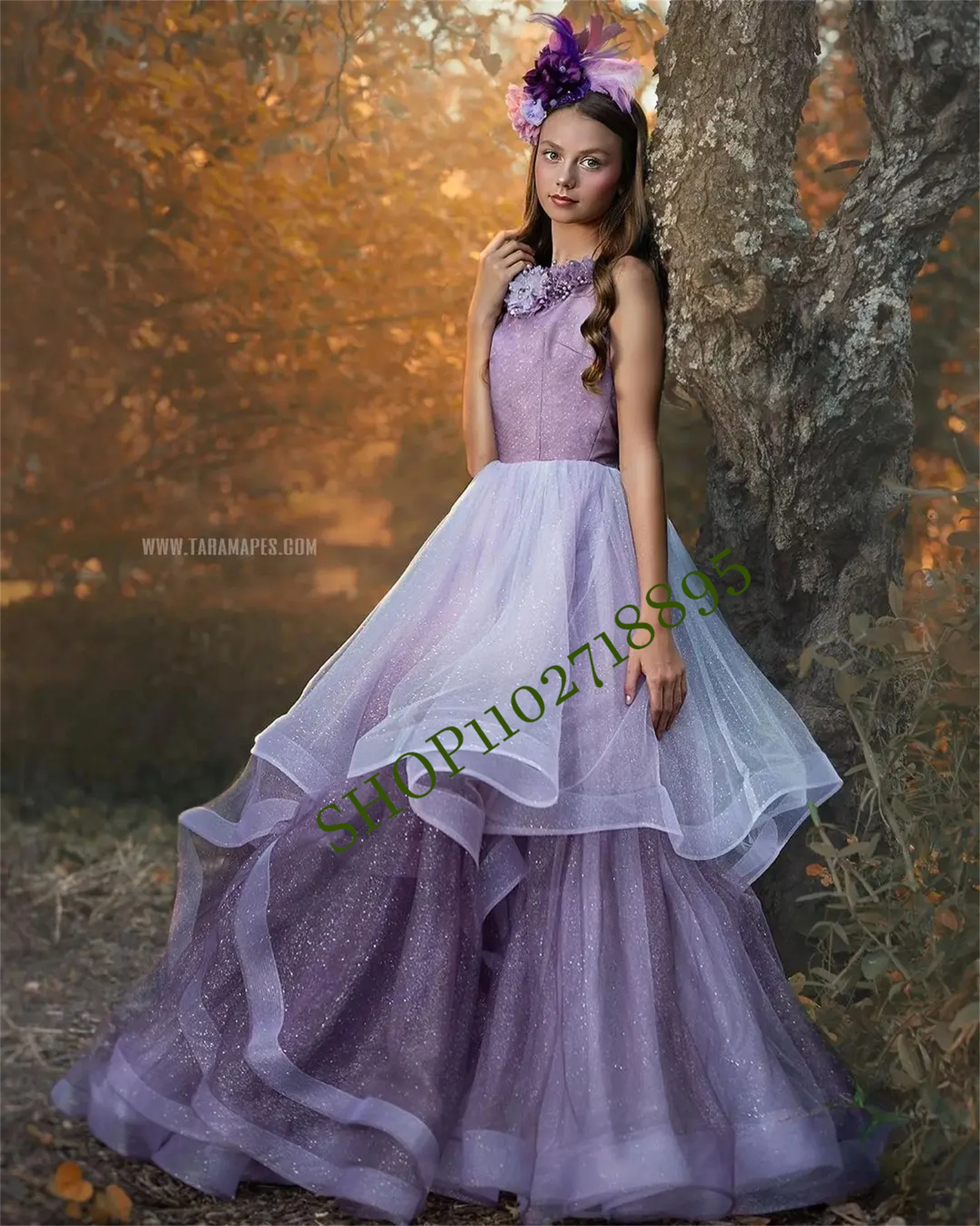 

Sprinkled with Glittery Fairy Dust Flower Girl Gown Features a Layered Ombre Skirt Cascading Overlay Floral Pearls