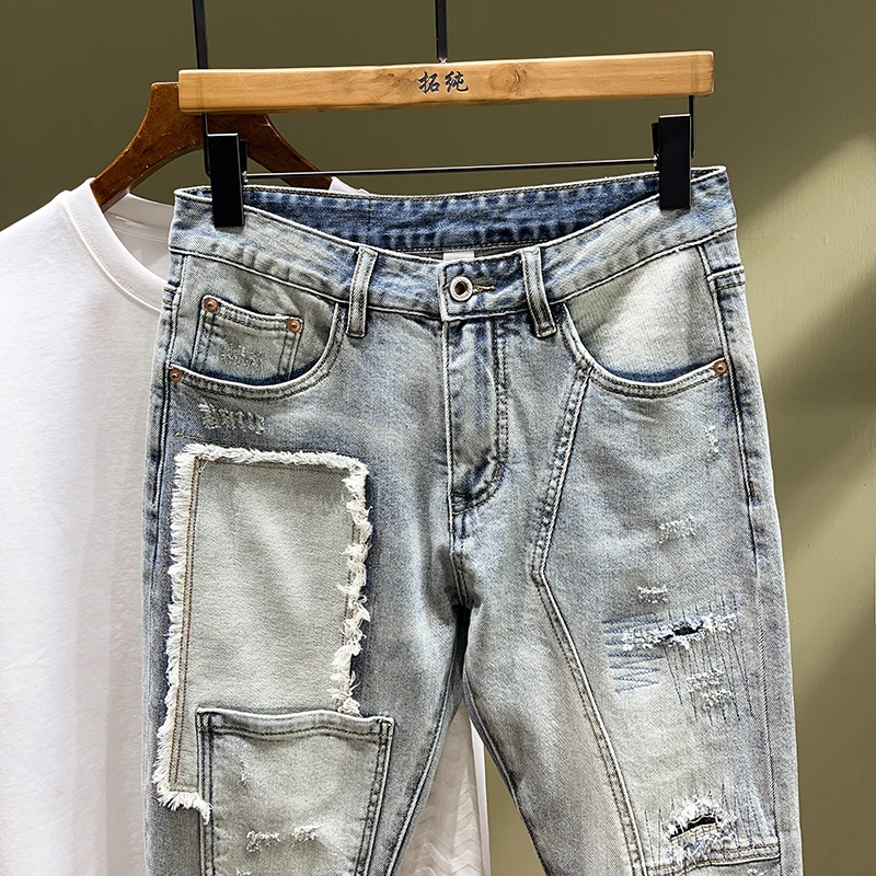Retro street personality splicing men's jeans broken holes embroidery patches stretch Slim straight pants light blue summer new