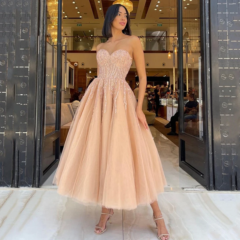 

Musetta Champagne Short Prom Dresses Sweetheart Beading Sequined Saudi Arabia Formal Party Gowns Tea Length Homecoming Dress