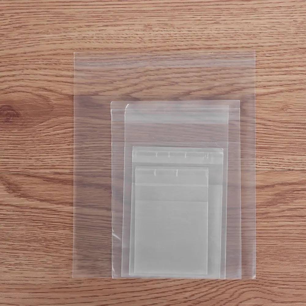 LIUXIN Sacchetto Regalo per Biscotti in plastica Trasparente a Pois in cellophane Trasparente da 100 Pezzi con Sacchetto Autoadesivo Fai-da-Te