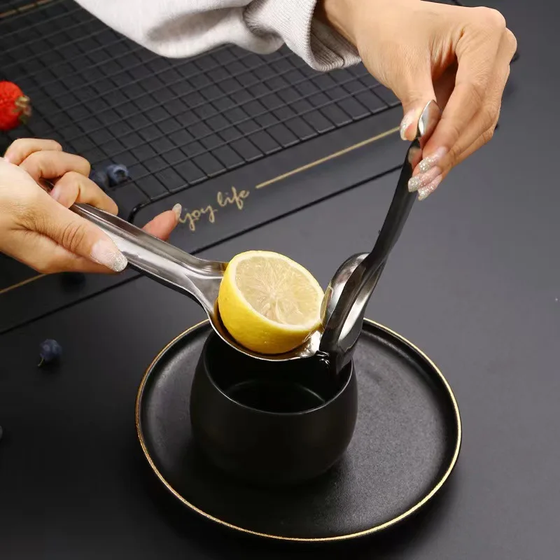 Stainless steel manual lemon clamp juicer squeeze lemon juice artifact home hand pressure mini small juicer