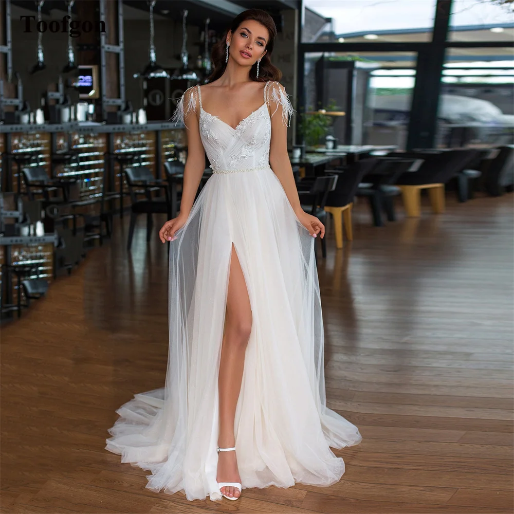 

Toofgon Glitter Tulle Lace Formal Wedding Dresses For Bride Feathers Beaded Backless Women Party Dress Princess Bridal Gowns