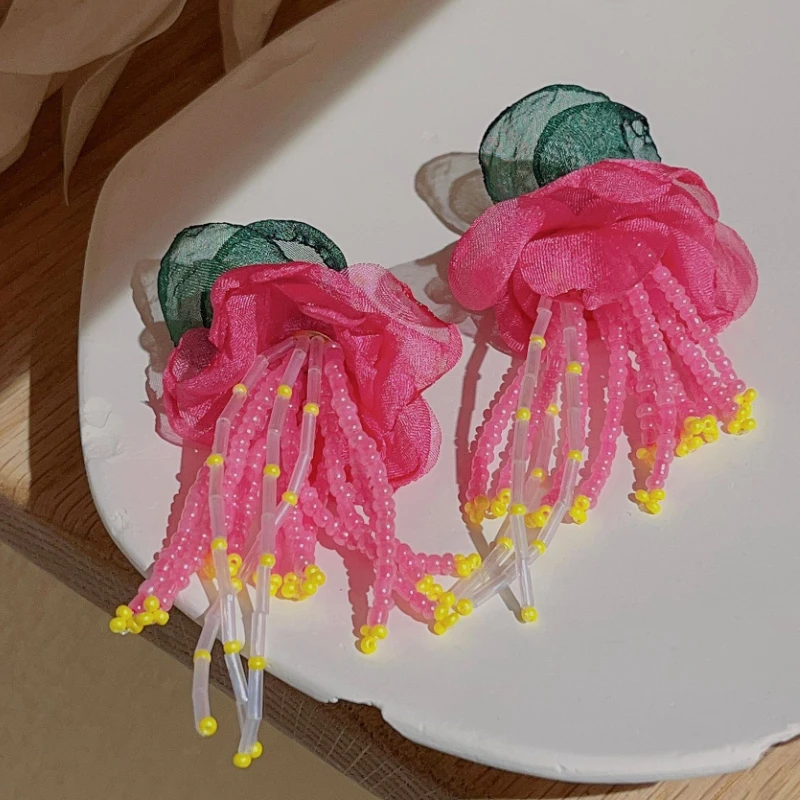 تراجي مشغولة يدويا أزهار 1