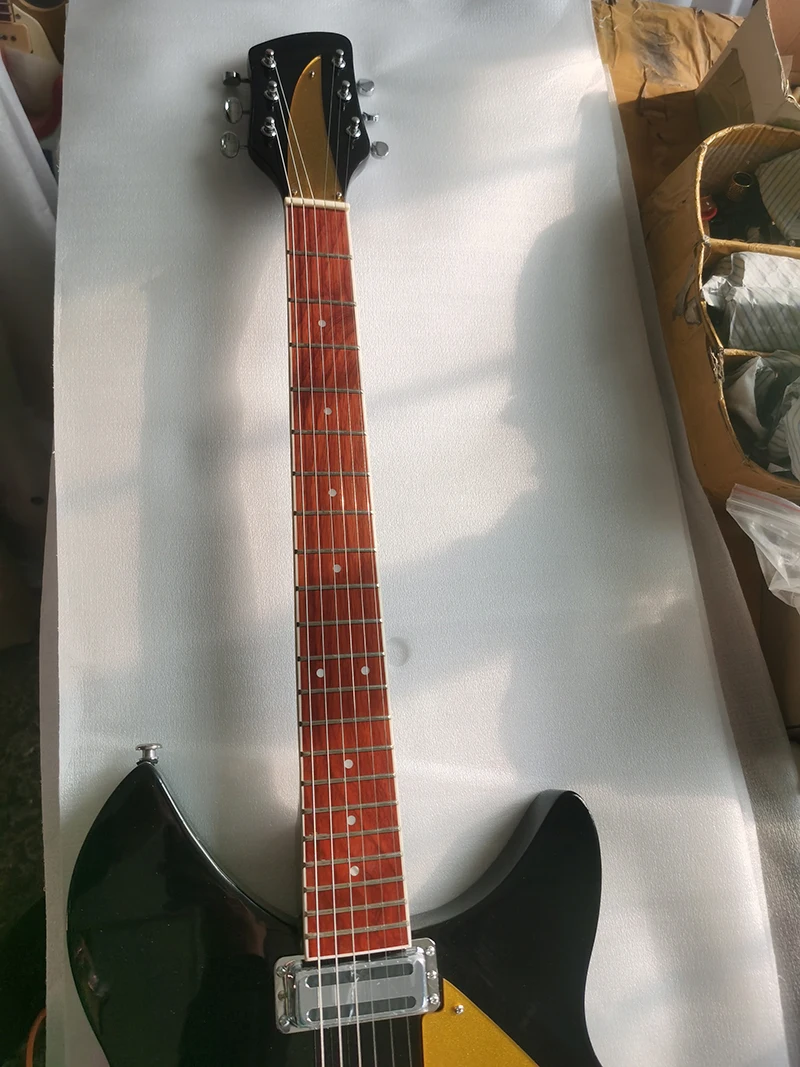 Black Rickenbacker 6-string electric guitar, two pickups, high quality guitar, vibrato bridge, yellow guard, in stock