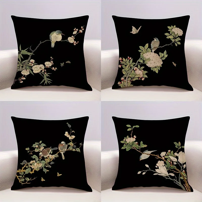Four botanical bird and floral pillow covers on black backgrounds