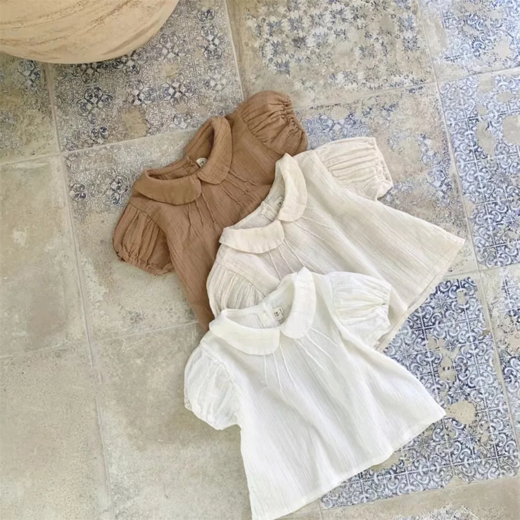 

2023 Summer Baby Girls Short Sleeve T-Shirts Solid Cotton Breathable Toddler Girl Doll Collar Tee Shirt Kids Puff Sleeve Tops