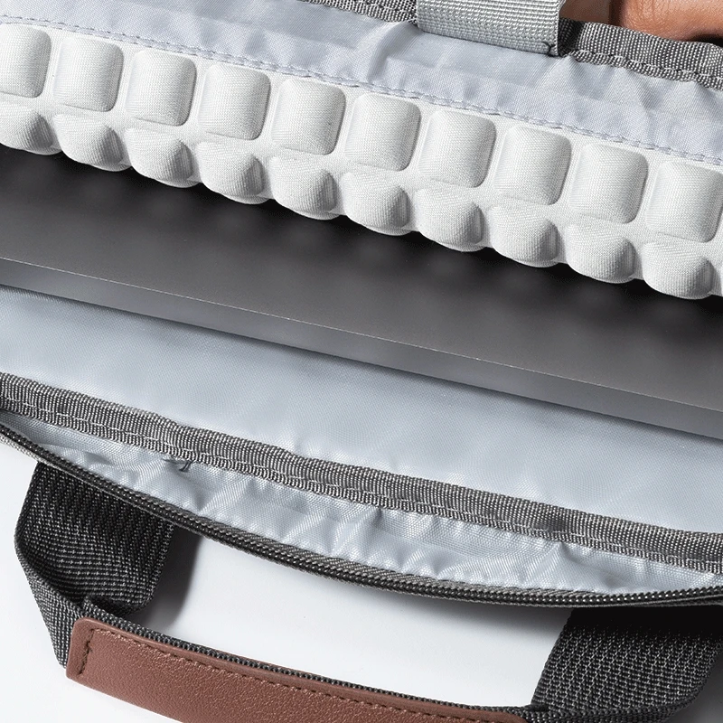 Stylish and functional laptop bag for various MacBook and laptop models