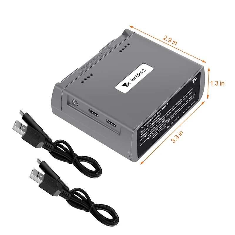 Chargeur batterie drone Mini 2/2SE, hub double posé sur une surface, prêt à charger