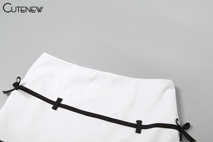 Conjunto de 2 piezas con lazos y rayas para mujer, top corto con escote en V y minifaldas de cintura alta, atuendos impresionantes.