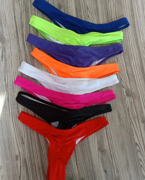 

Hot Sale New Fashion Ladies Thong Swim Trunks Multiple Colors Solid Color Pleated Thong Swimwear Women Bikini Swim Trunks