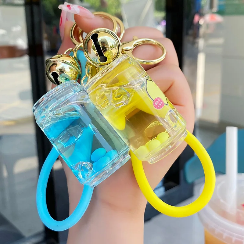 Cute Vitality Girl Lemon Soda Bottle Quicksand Portachiavi Cartoon Floating Ice Jelly Bean Fruit Drink Lattine Ciondolo Portachiavi Liquido