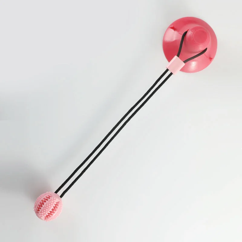 Engaging Sound-Emitting Dog Toy with Suction Cup and Treat Dispenser - Durable Rubber Ball