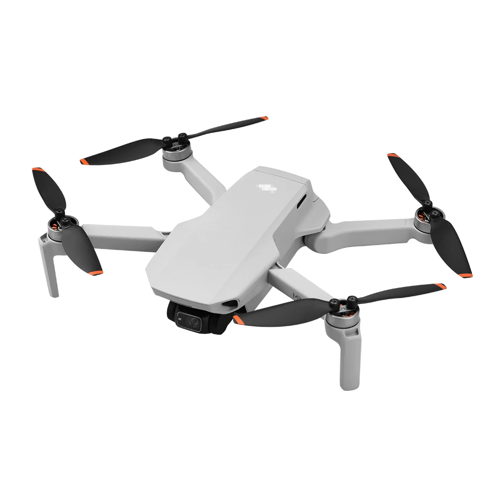 Hélices silencieuses DJI Mini 2 montées sur drone, offrant un vol stable et réduisant le bruit.