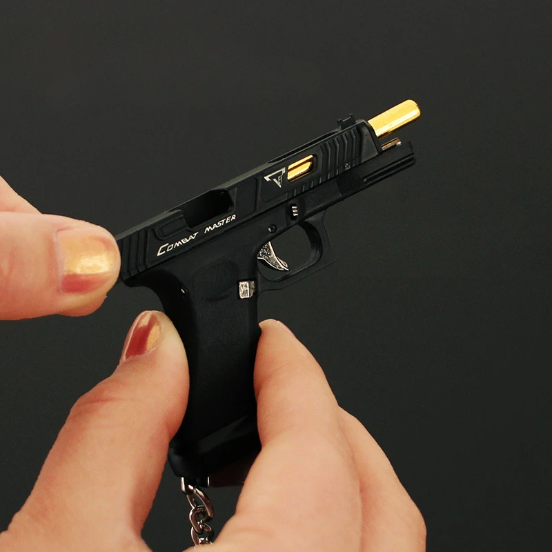 Bullet Gun Toy Miniature Ornament Miniature Figurines Mini Stress Relief Toy 1:3 Scale G34 Keychain Pendant Realistic Model Detachable Micro Tactical Pistol Model Men's Gift Decompression Gadget