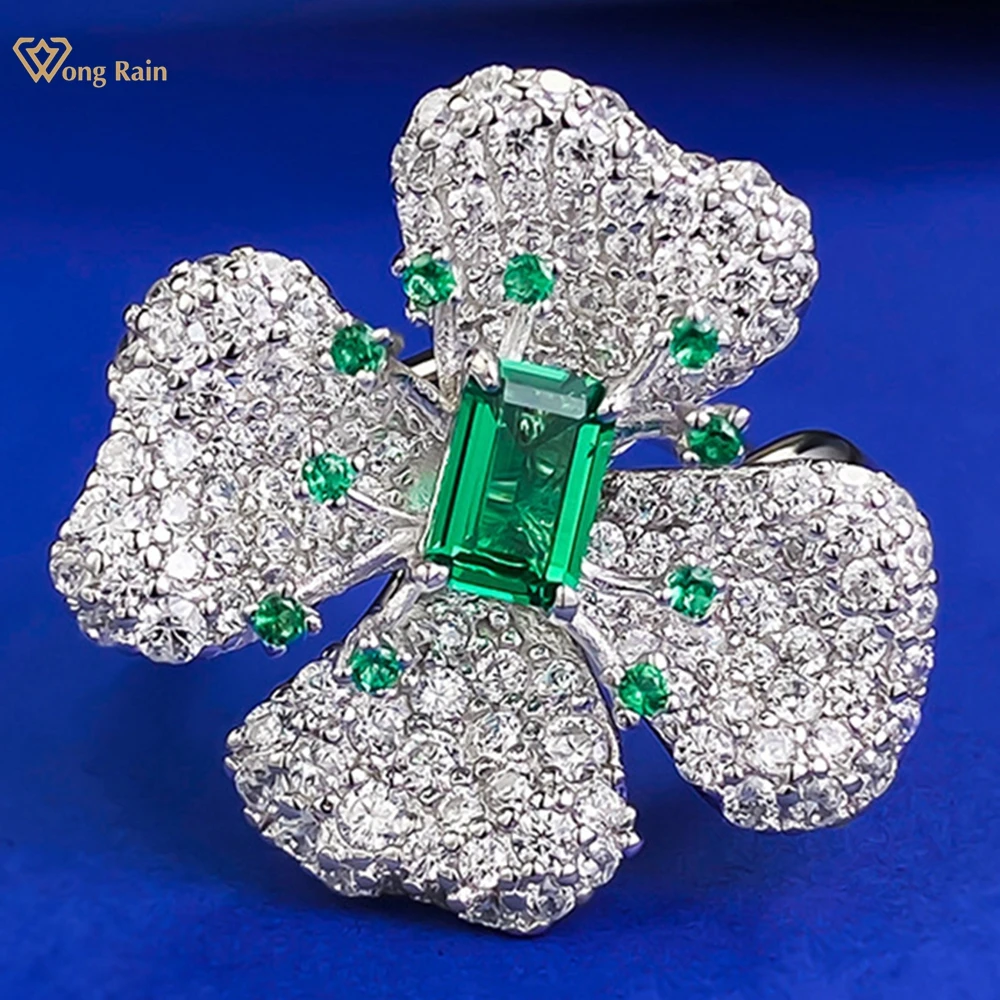 

Wong Rain 100% 925 Sterling Silver 4*6 MM Emerald High Carbon Diamond Gemstone Adjustable Flower Ring for Women Fine Jewelry