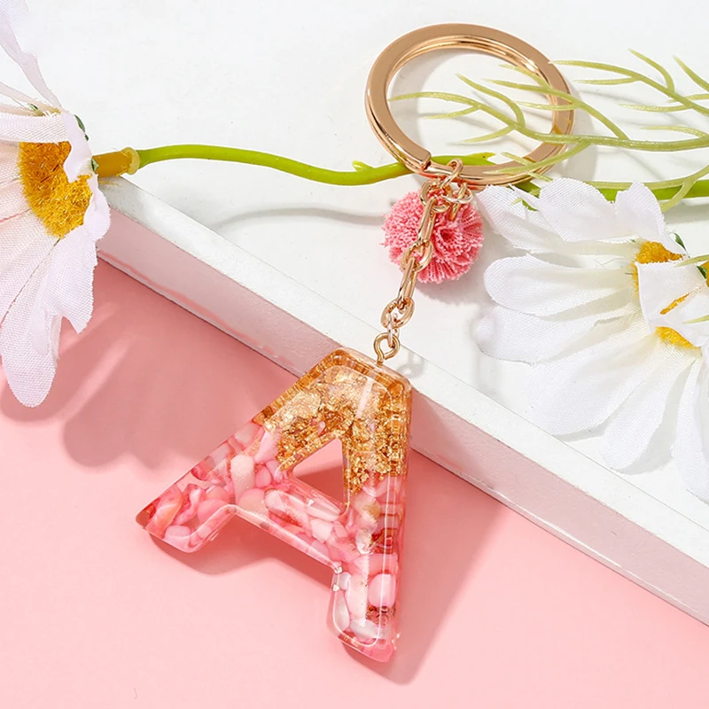 Pink Pompom Alphabet Charms Keychains For Women Golden Foil Resin Quicksand Letter Pendant Key