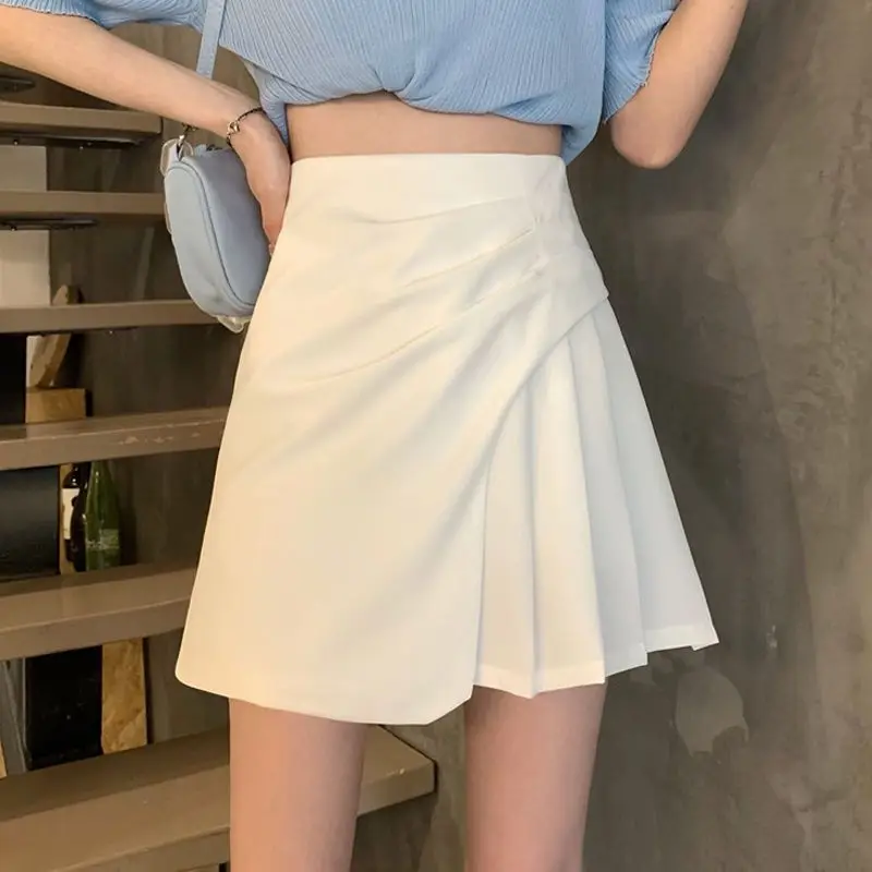 Fashion Zipper Solid Color Asymmetrical Pleated Short Skirts Women's Clothing 2024 Summer New Loose All-match Irregular Skirts