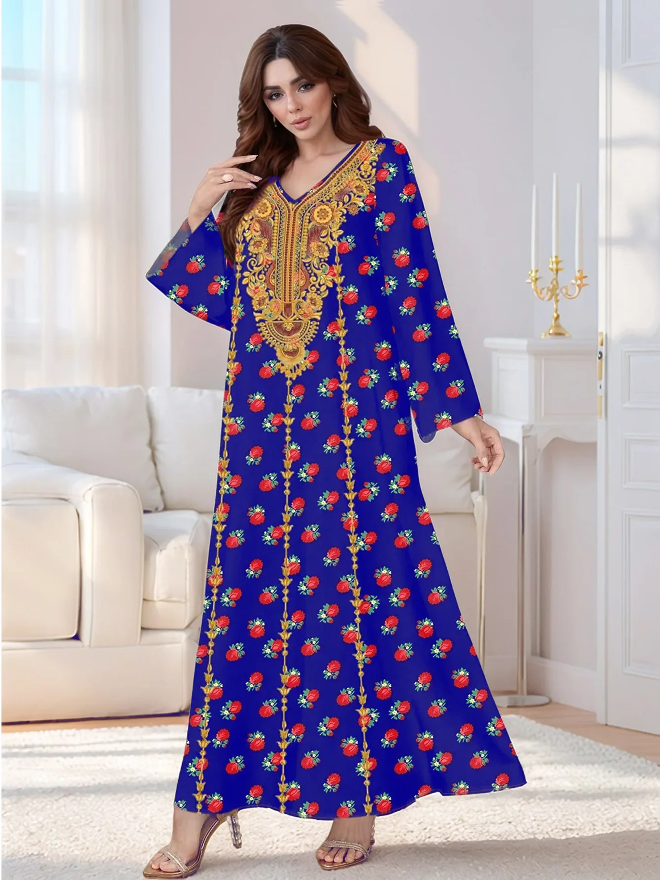 فستان طويل أزرق ملكي بتطريز ذهبي ونقشة ورد