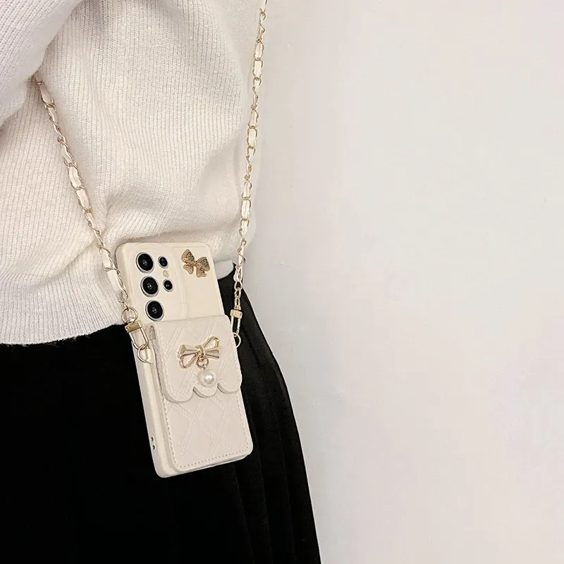Pearl Bow Chain Wallet Phone Case with Elegant Design