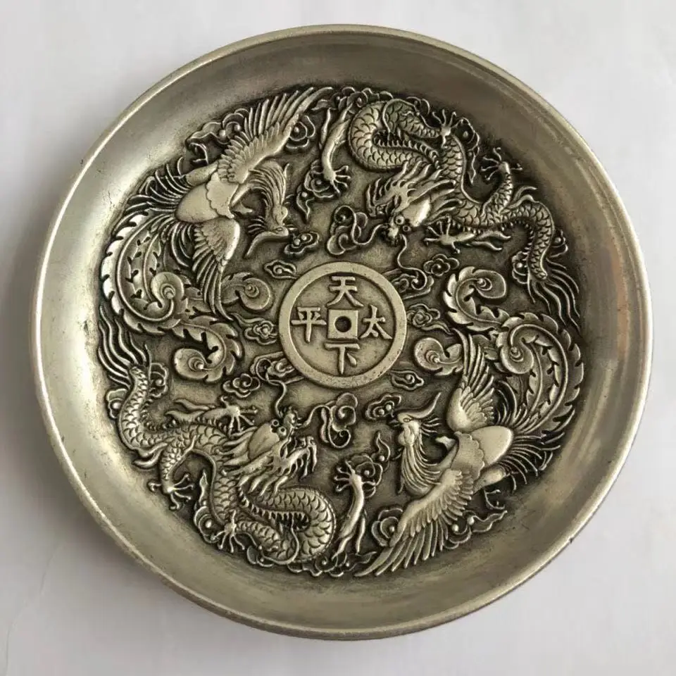 

QING QING QIANLONG'S IMPERIAL GIFT OF DOUBLE DRAGONS AND PHOENIXES, THE WORLD TAIPING, SILVER-PLATED PLATES, DIAMETER OF 10CM