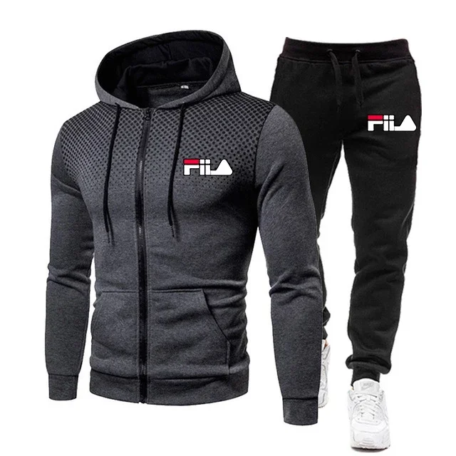 Man wearing hoodie and pants jogging suit in casual spring/fall streetwear style
