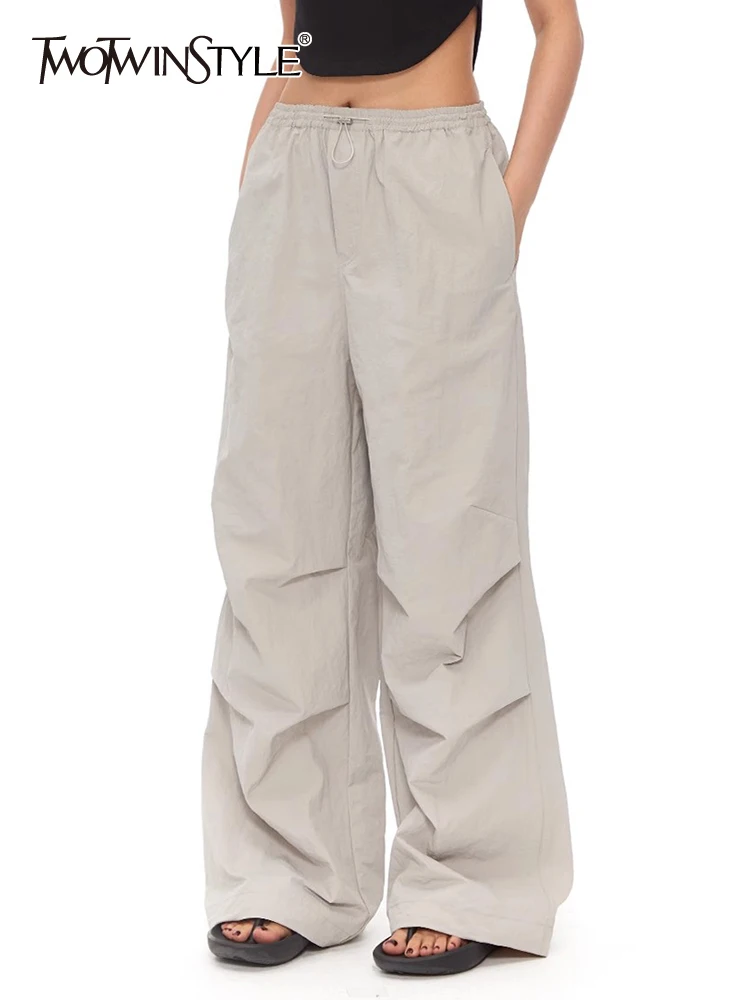 

TWOTWINSTYLE Solid Patchwork Drawstring Pants For Women High Waist Spliced Folds Loose Wide Leg Cargo Pant Female Fashion 2023