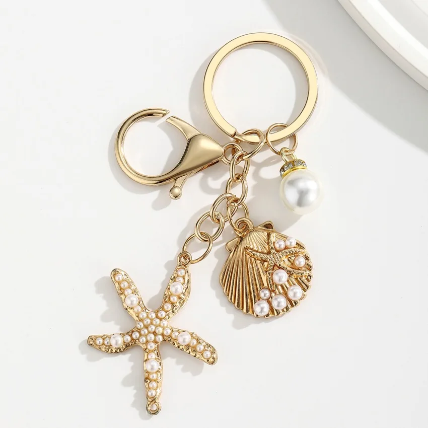 מחזיק מפתחות עם תליון כוכב הים מרהיב ומודרני, מתאים לרכב או לתיק