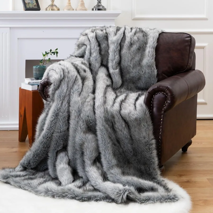 Extra large faux fur blanket perfect for couch or bed super soft and fluffy with elegant grey color featuring black tips revers