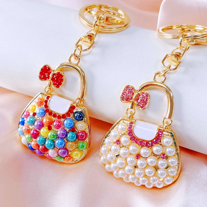 

2023 Fashion Keychains for Women Rhinestone Pearls Bags Shape Key Chains Jewelry for Car Keyrings Women's Bags Decoration