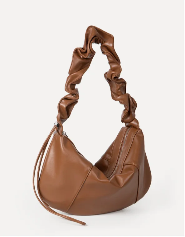 female Korean niche design, drawstring pleated soft leather, high-end feeling, large capacity handbag_voghion.com