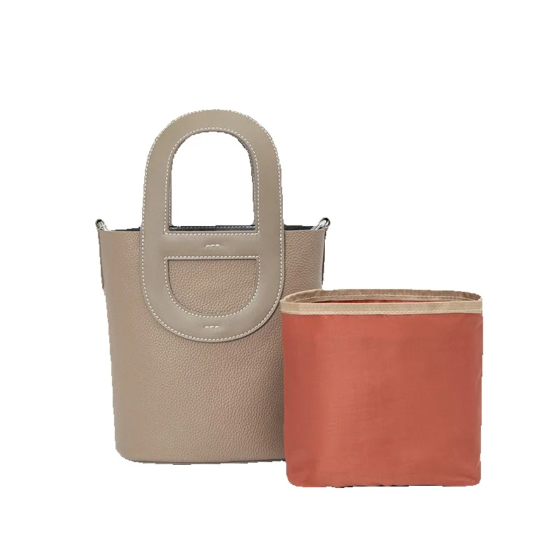 Design originale nuovo naso di maiale da donna a mano con tracolla a tracolla semplice borsa a secchiello in tinta unita da pendolare_voghion.com