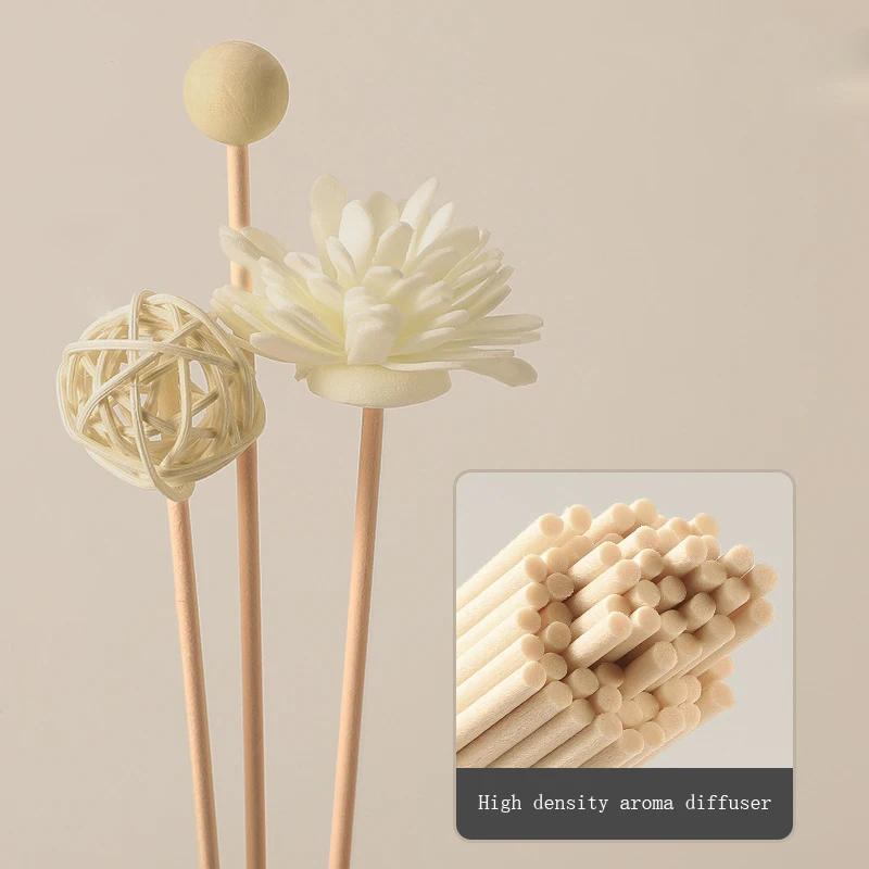 Assortment of flower rattan diffuser sticks displayed on a clean white background