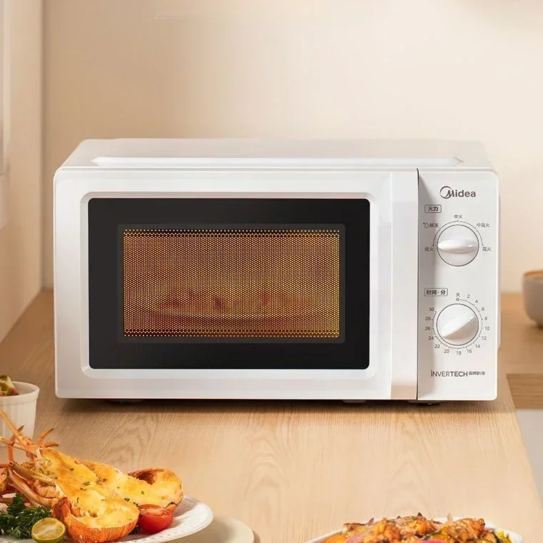 Home microwave oven. Lightweight, portable. Has 5-speed turntable for heat distribution. 2