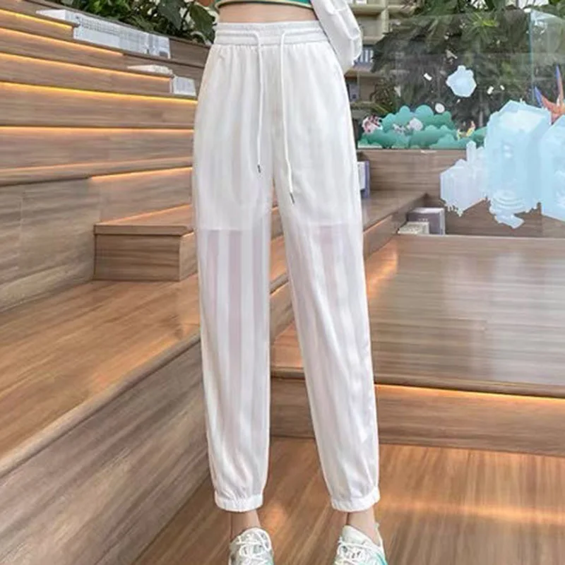 Fashion Loose Elastic High Waist Shirring Bandage Hollow Out Pants Female 2023 New Commute All-match Solid Color Casual Capris