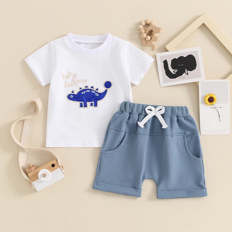 

2024-03-19 Lioraitiin Toddler Boy Summer Outfit Dinosaur Embroidery Short Sleeve Tops with Elastic Waist Solid Color Shorts Set