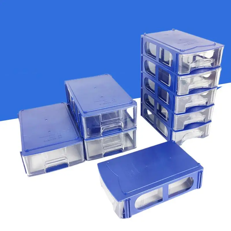 Vue de dessus d'une boîte de rangement transparente pour outils de modélisme, avec compartiments