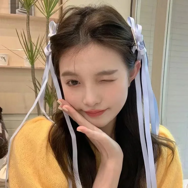 Рисунок 5 - Заколки для волос с длинными лентами и кисточками