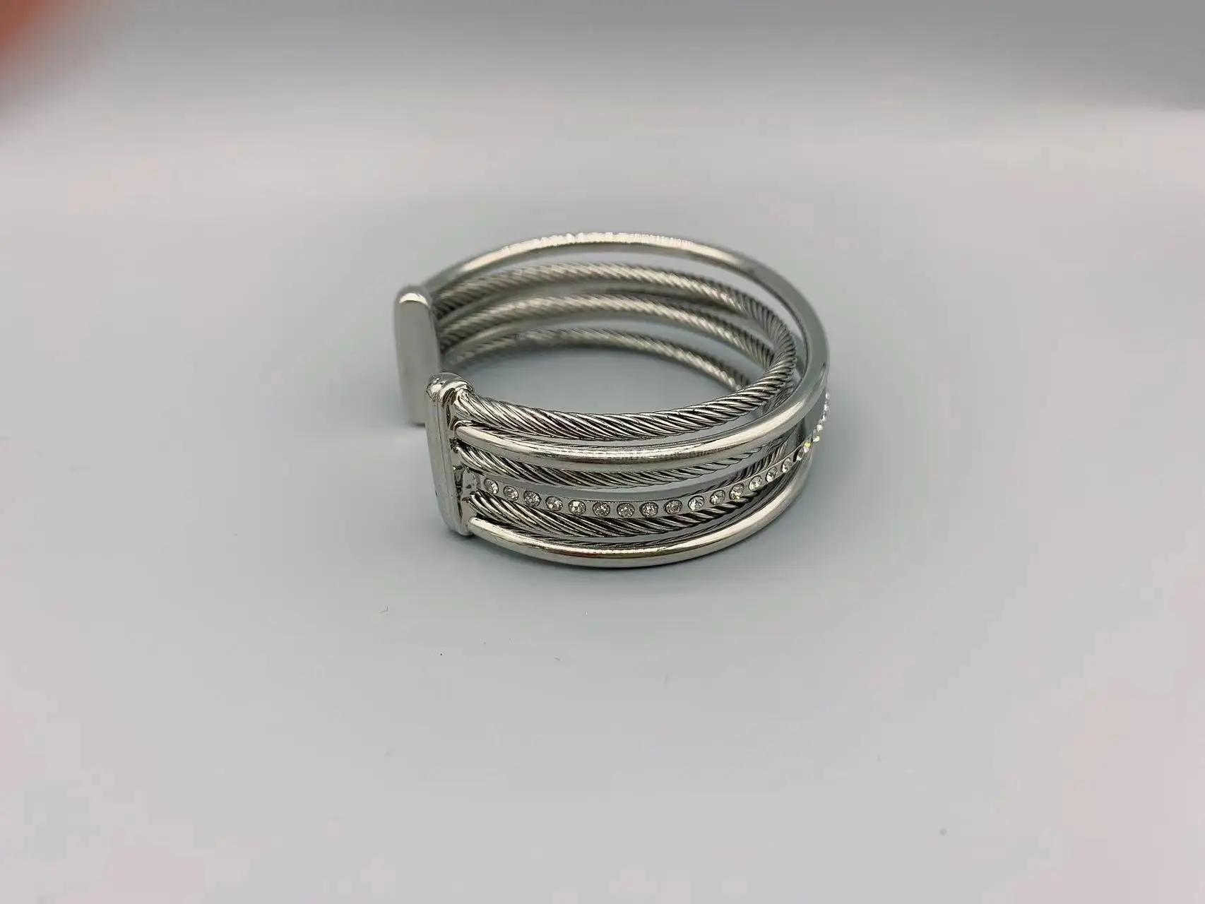 Le Han Jewelry Silver Crossover Four  Row Cuff Bracelet With Clear Cubic Zirconia 23 MM