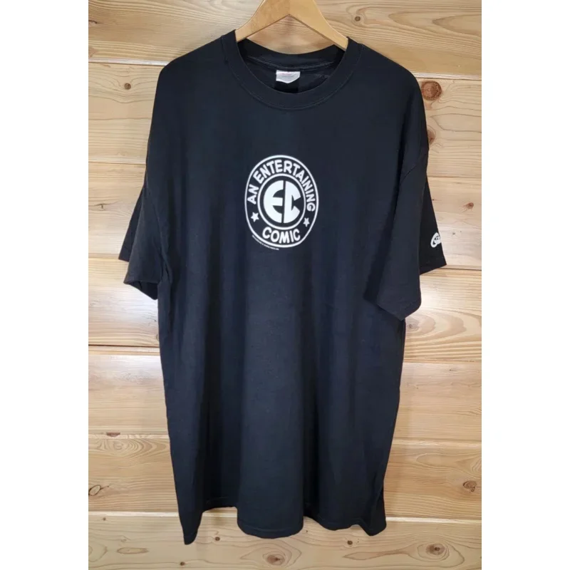 

VintageAnEntertainingComic2002MenTShirtSize2XLBlackCenterLogoGraphilongorshortsleeves