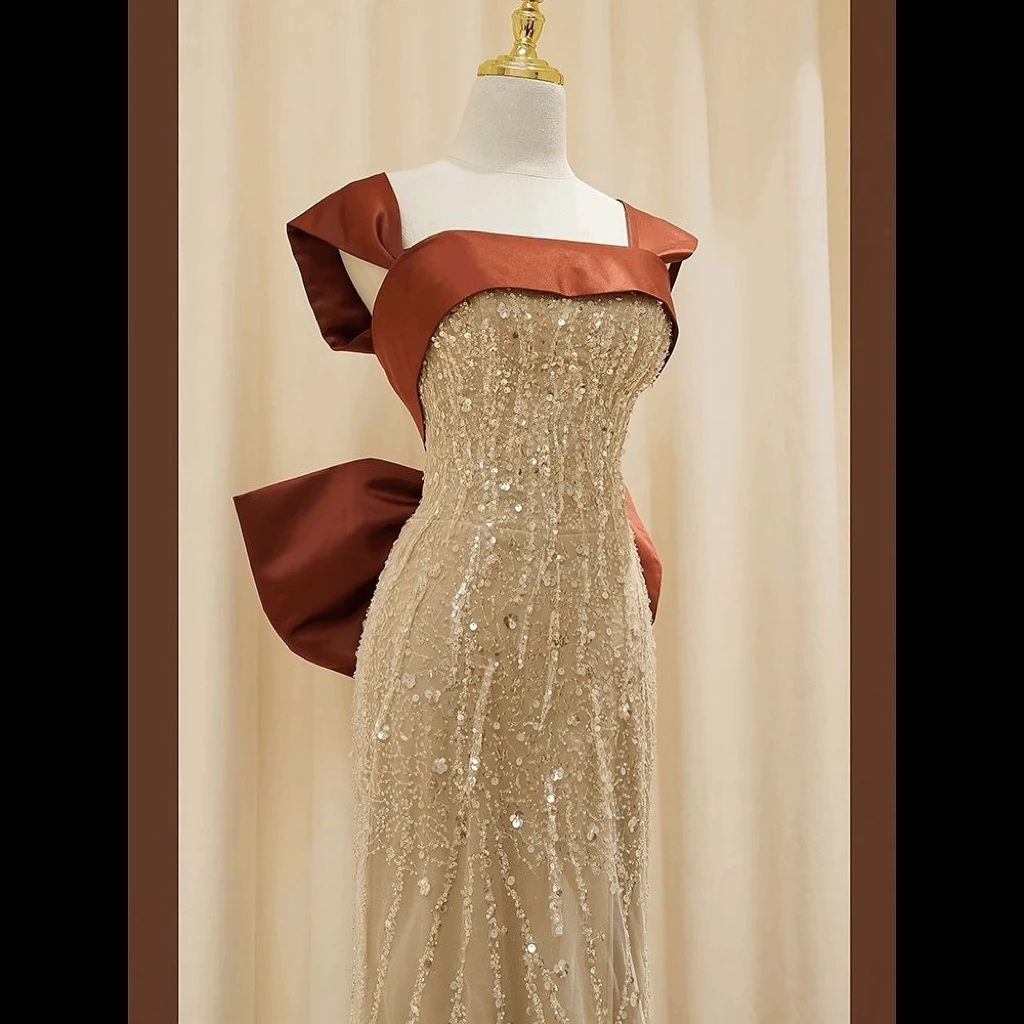 

Mermaid Celebrity Dresses Champagne Gold Strapless Cap Sleeve With Detachable Bows Beaded Crystal Sexy Prom Sequin Party Gowns