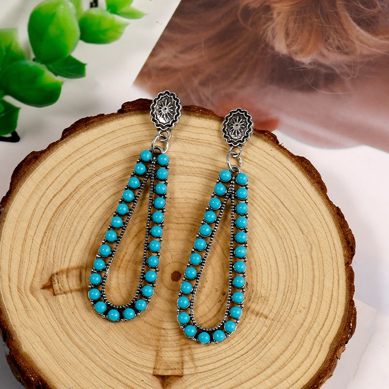 

Vintage Droplet Hollow Inlaid Turquoise Alloy Earrings in Bohemian Style