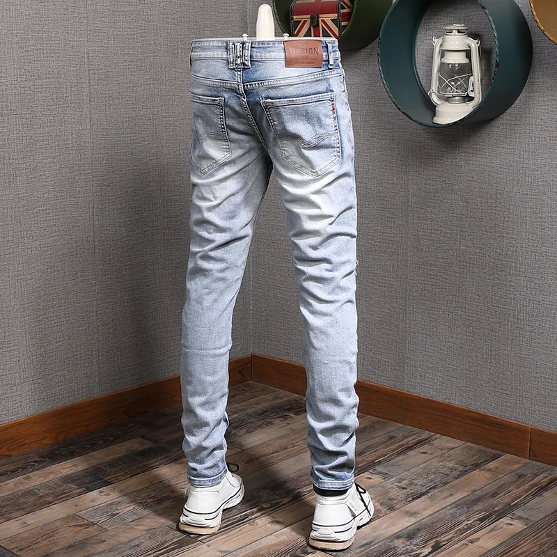 Newly Designer Fashion Men Jeans Retro Light Blue Elastic Slim Fit Destroyed Ripped Jeans Men Streetwear Hip Hop Denim Pants